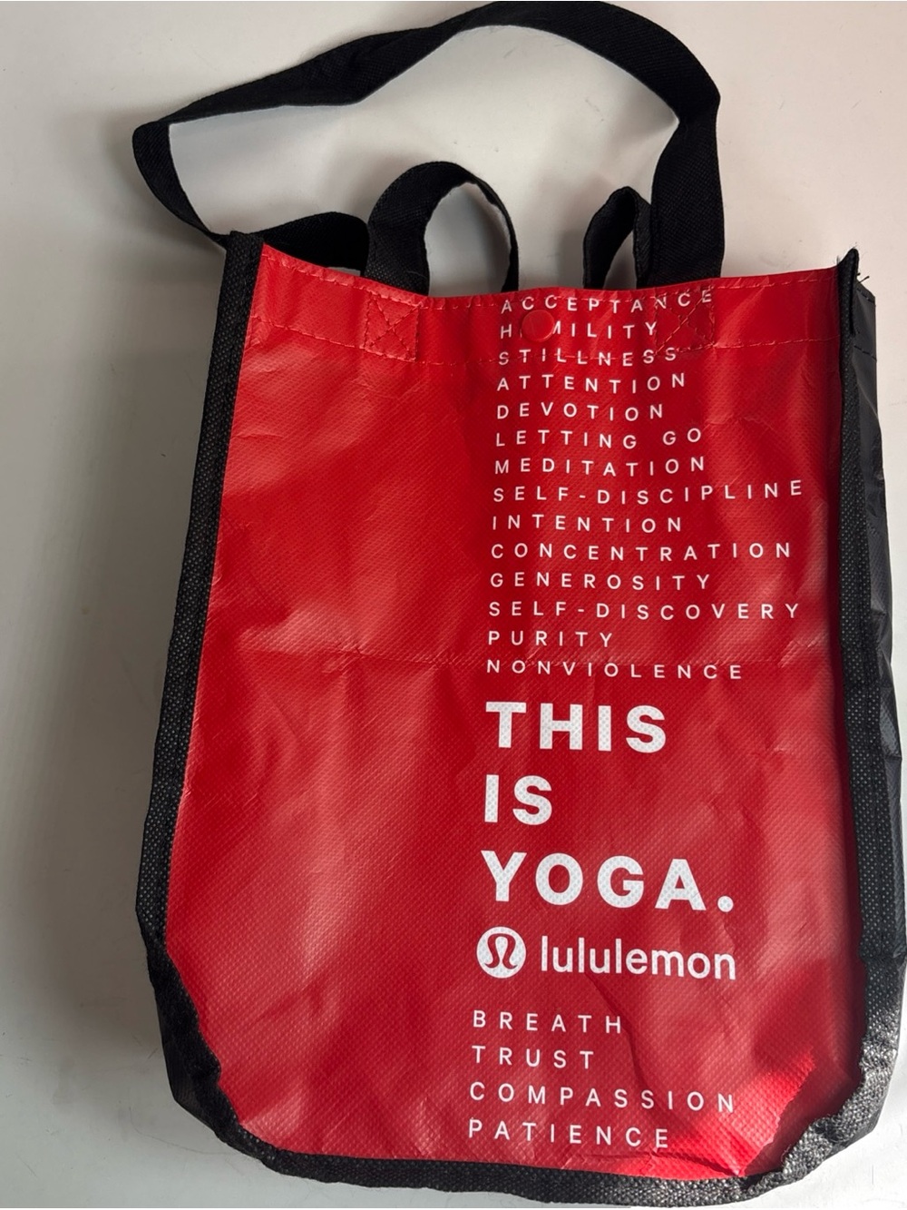 lululemon athletica Red Tote Bag with Black Trim - THIS IS YOGA Print